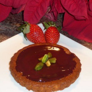 Pistachio Cakes with Chocolate Rum Sauce