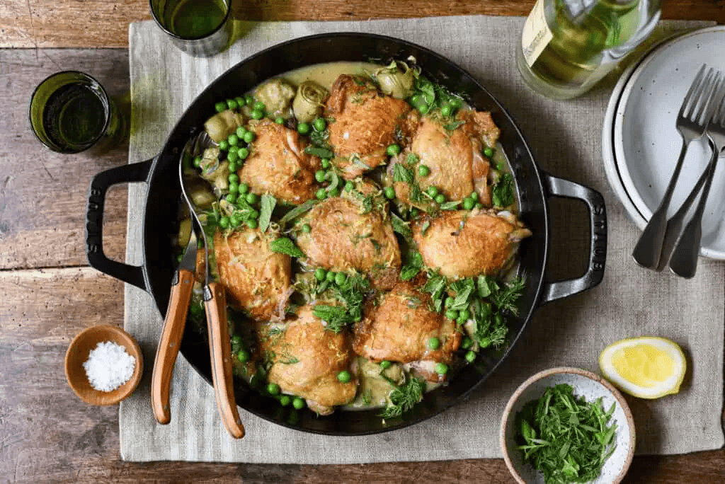Braised Chicken Thighs with Artichokes and Spring Peas