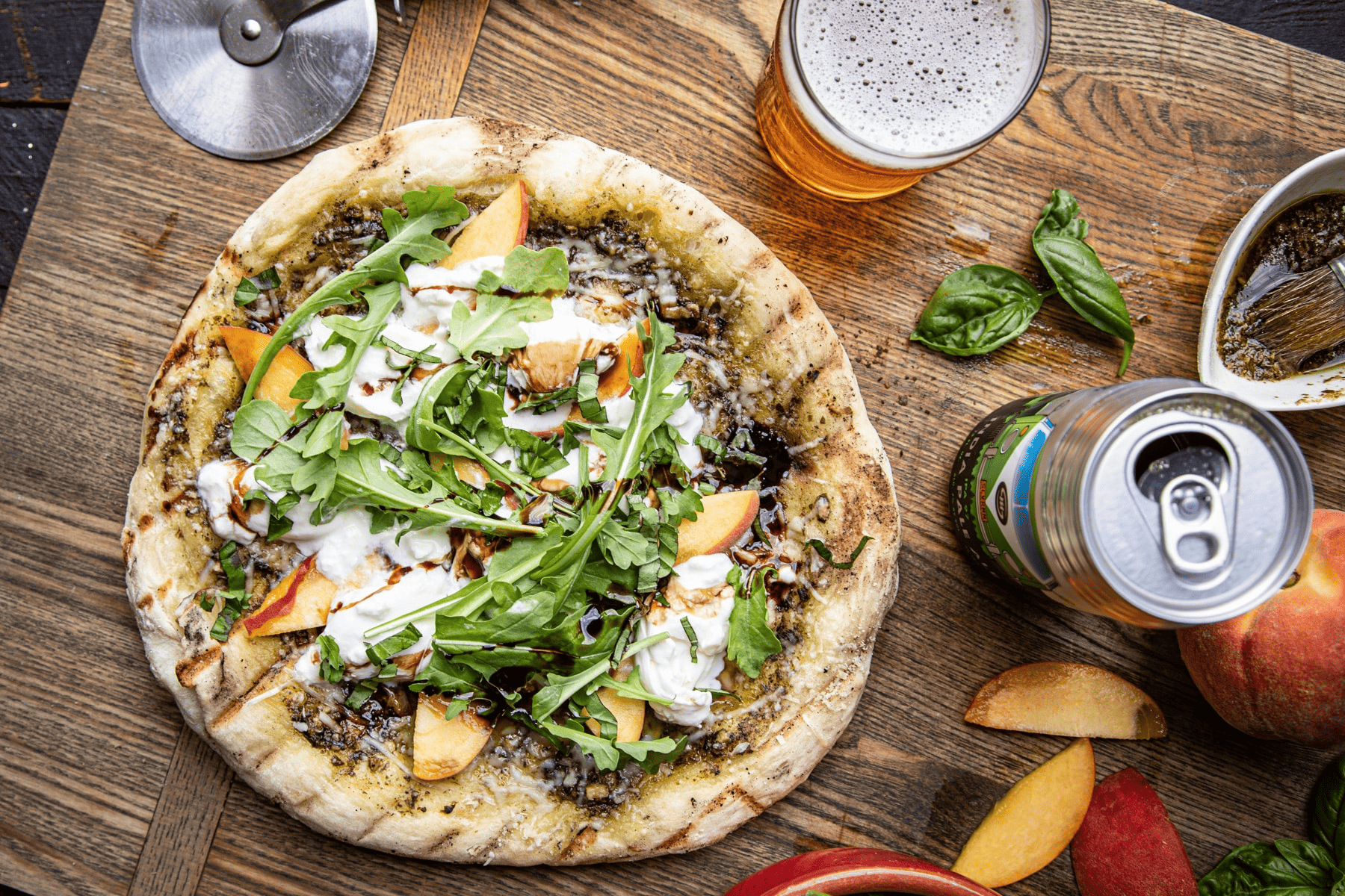 Grilled Beer Crust Pizza with Peaches, Burrata, and Pesto
