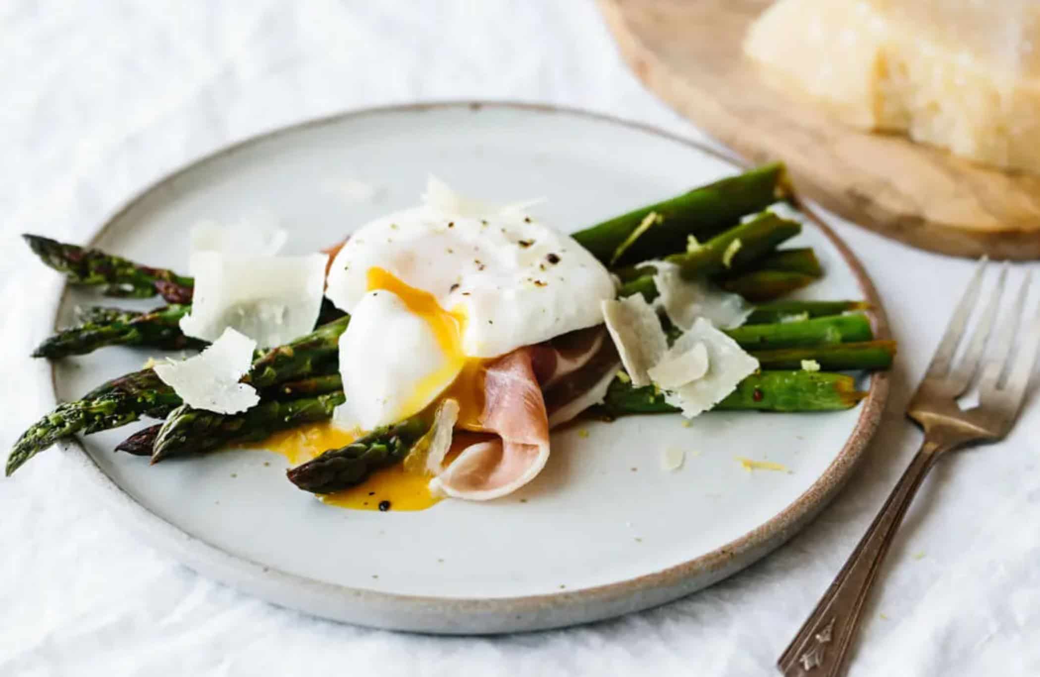 asparagus poached egg and prosciutto Photo Credit Downshiftology